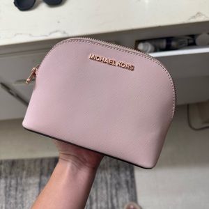 Michael Kors leather travel cosmetic bag in pink and rose gold
